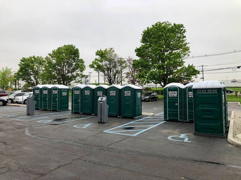 Portable toilets lined up at a parking zone in New York