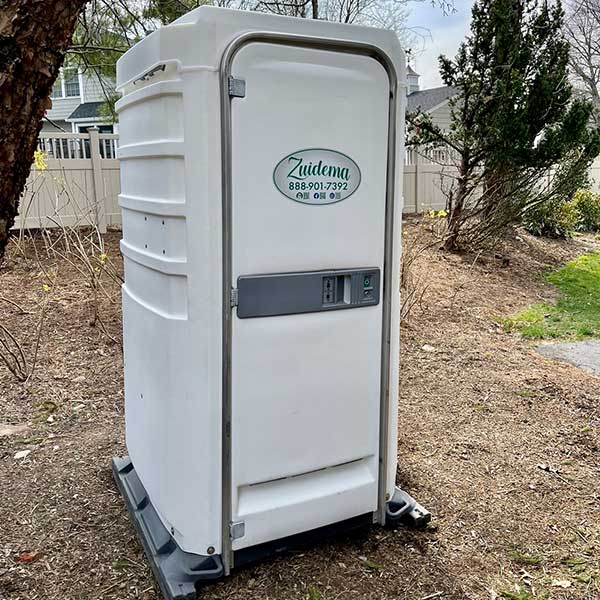 Deluxe portable toilet with a sleek and clean design for outdoor events in NJ & NY